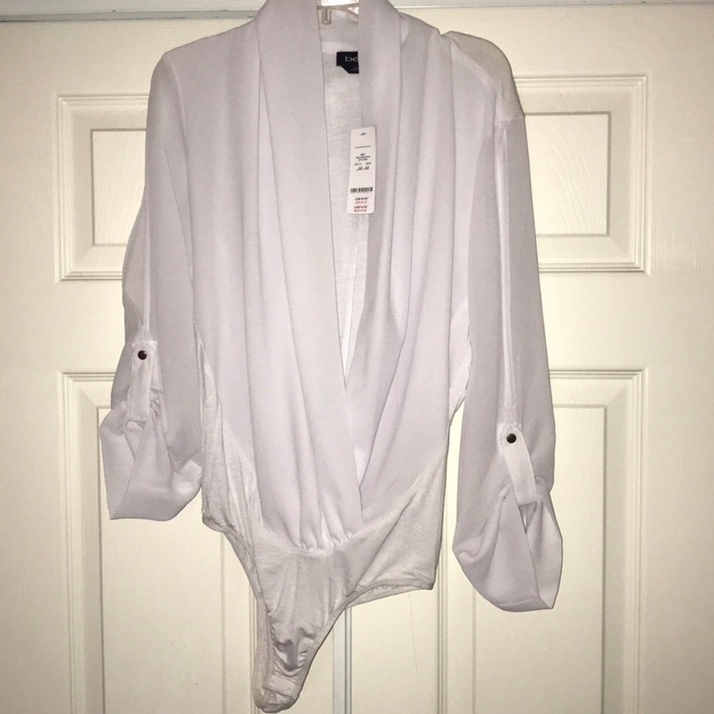 BEBE Longsleeve White sheer bodysuit low-cut front and arm slits. Size M